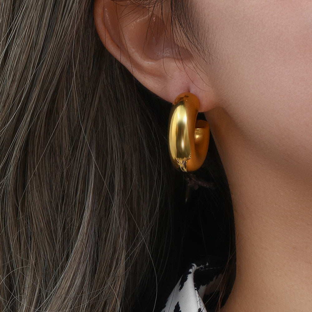 18k small hoop earrings, hypo-allergenic, water proof, sweat proof, and tarnish free. Made for everyday wear.