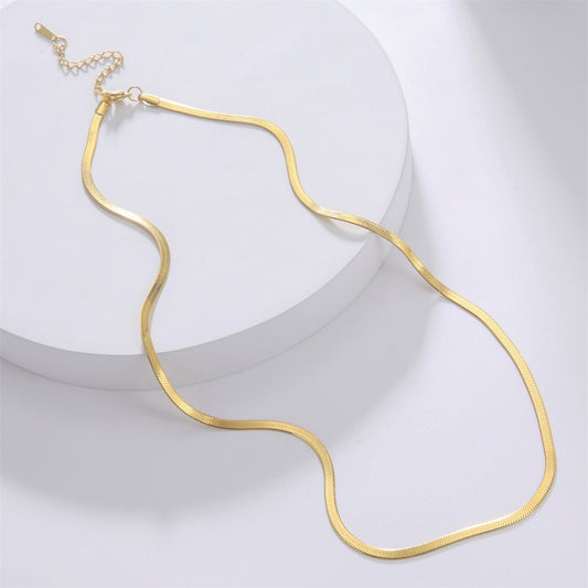 18k gold herringbone flat chain, hypo-allergenic, water proof, sweat proof, and tarnish free. Made for everyday wear.